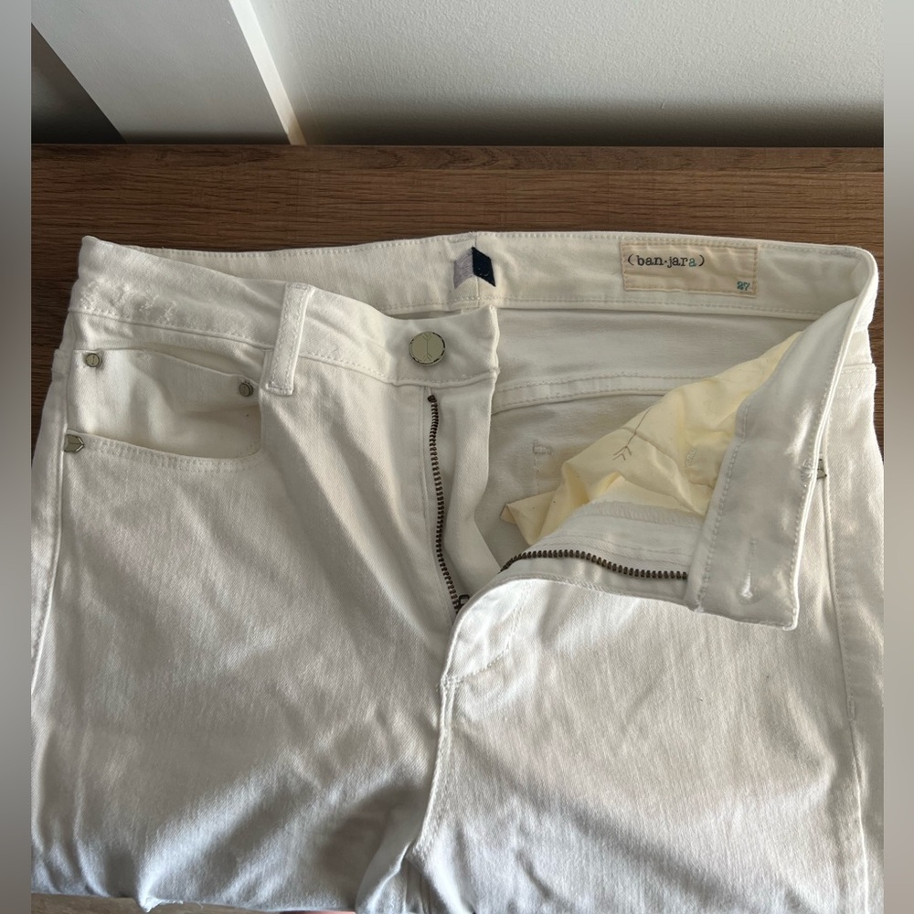 White wide leg pants with distressed bottom